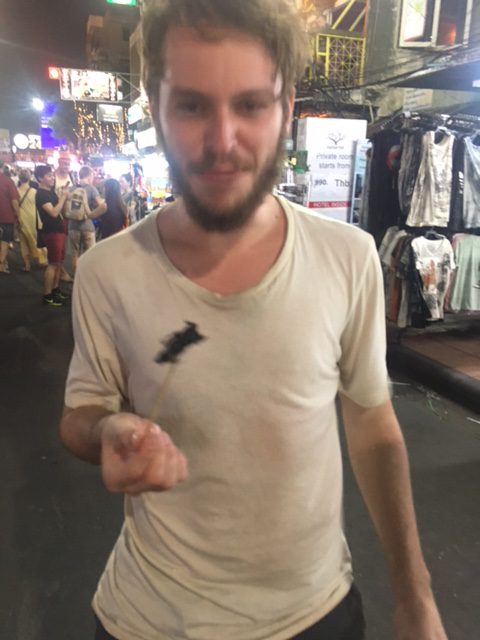 A scorpion on a street-food skewer in Bangkok