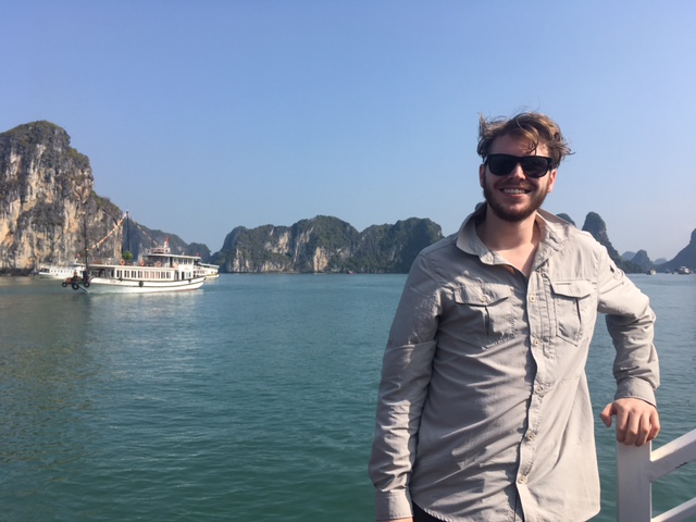 Limestone karsts rising from the water at Ha Long Bay