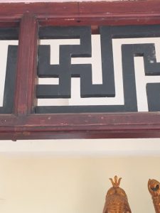 A traditional swastika motif on a temple at Nha Trang