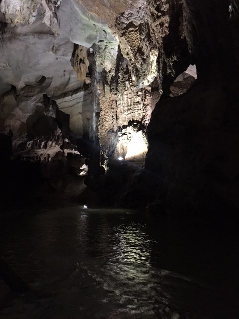 Boats at the mouth of Phong Nha cave