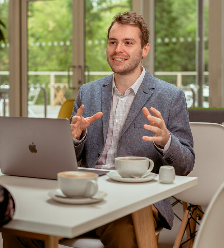 Josh Cox in a client meeting