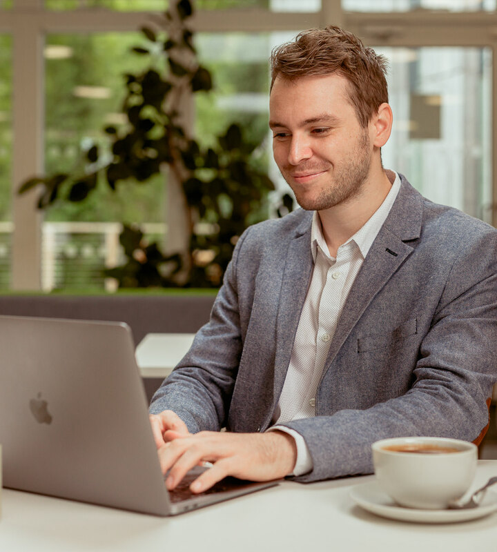 Josh Cox working at his laptop